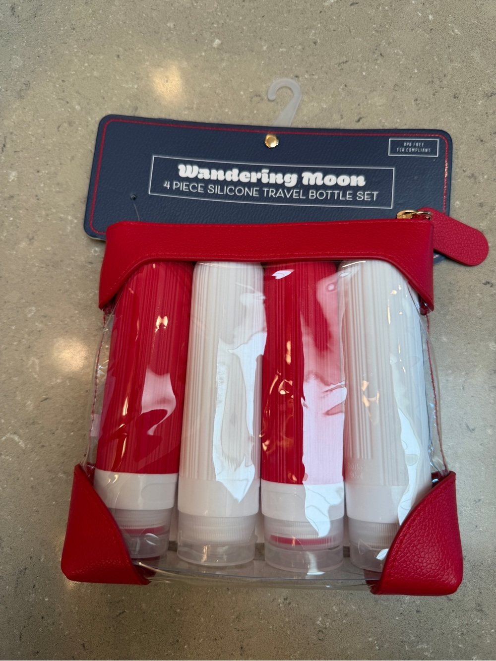 NWT 4-Piece Silicone Travel Bottle Set in TSA approved clear pouch for trips!